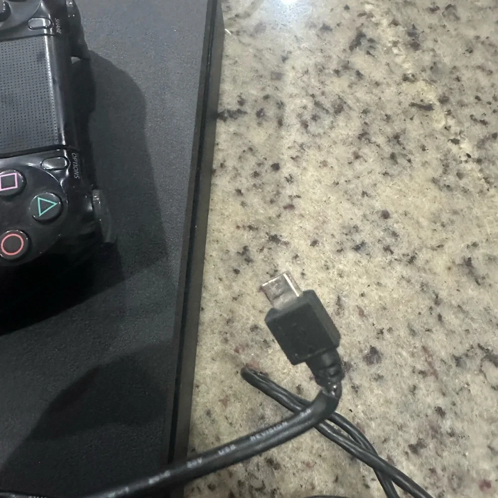 Sony Black Console with Dual Controllers